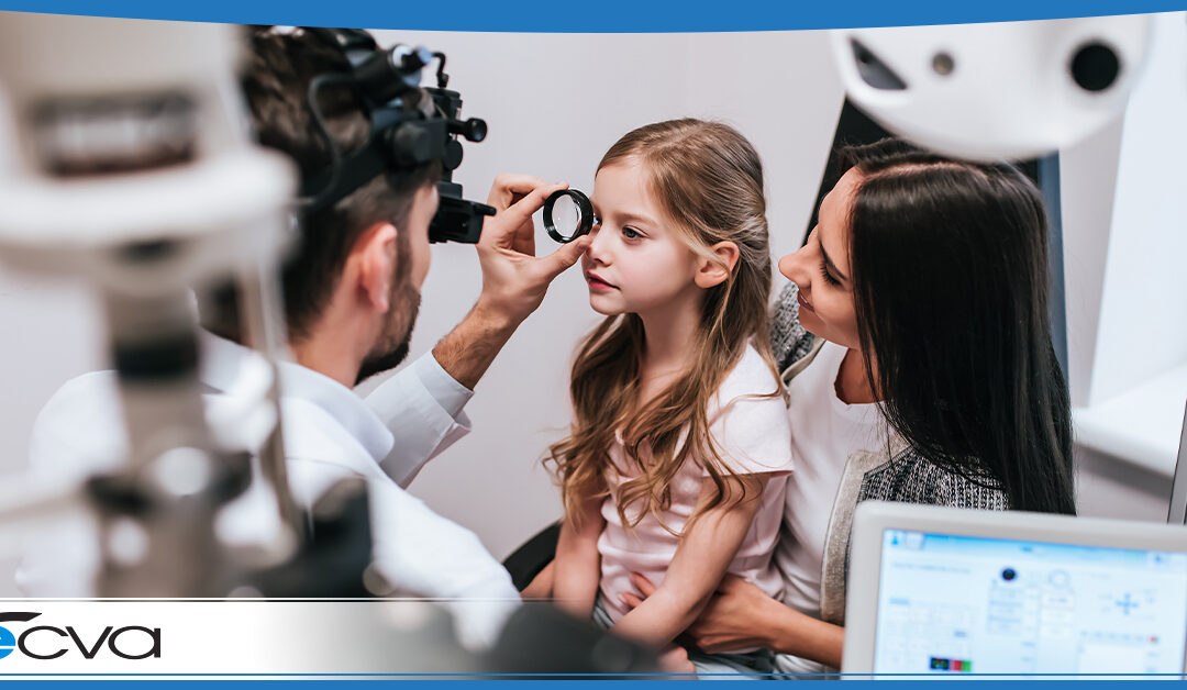 child receiving an eye exam