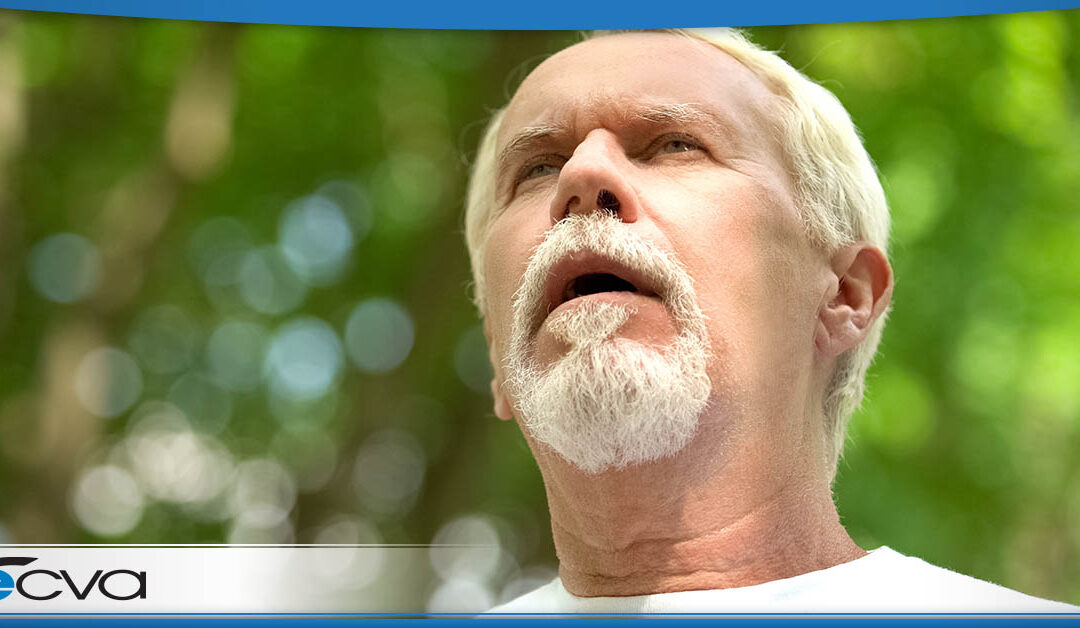 an older gentleman looking up at the sky